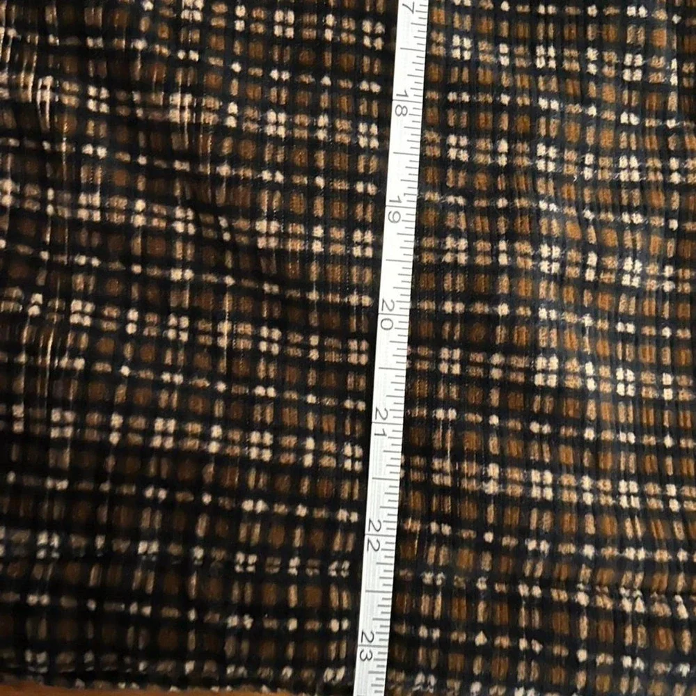 Brown plaid vest with faux fur hood
